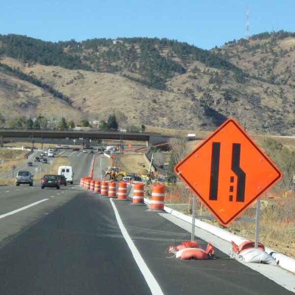 Road construction ahead, lane closure.